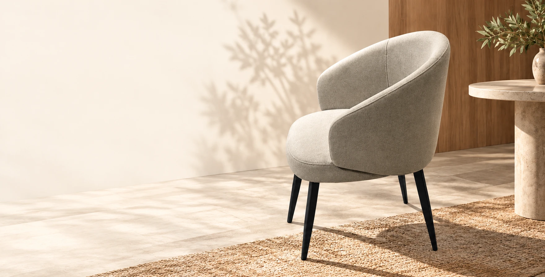Styled visual of the curved upholstered dining chair in a warm interior